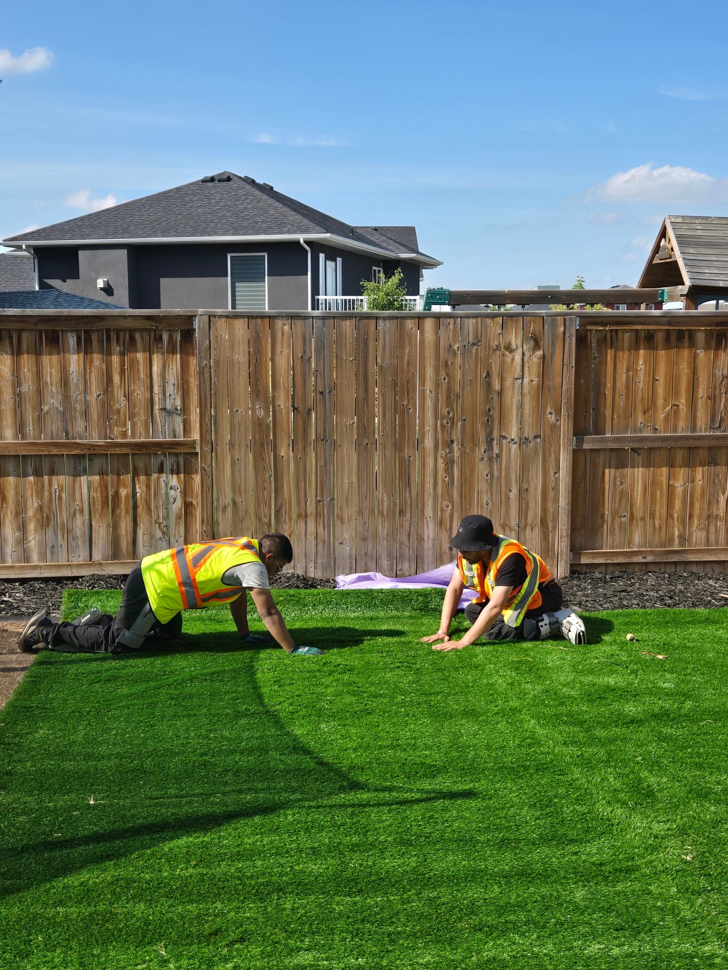 Stoonex Services crew installing a composite deck in Saskatoon